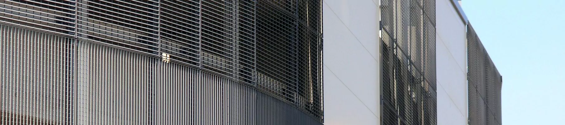 Steel grating and louvre external screens Sainsburys Redhill banner2 Steel grating and louvre external screens Sainsburys Redhill banner2